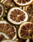 Close-up of dried lime slices, dehydrated fruit garnish for drinks and cocktails.