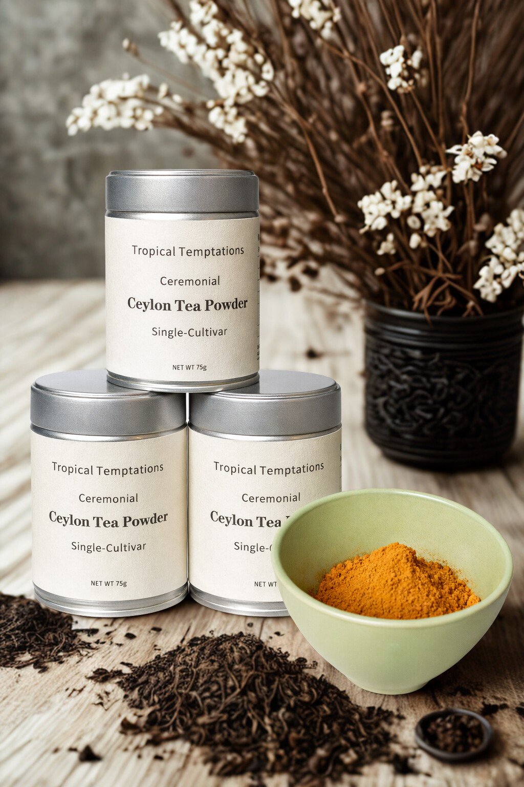 Ceremonial Ceylon tea powder tins with loose leaf tea and powdered tea in a green bowl